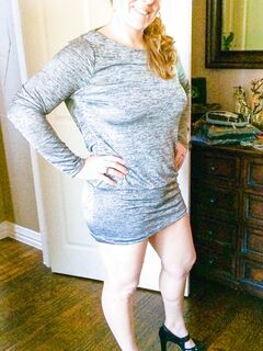 Redhead MILF Strips to Show Pussy and Tits