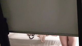 Neighbor closing her blind showing her naked lower body to all