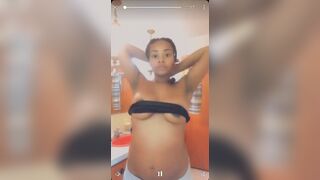 Pregnant Black Girl showing off titties for cash from Akron