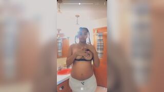 Pregnant Black Girl showing off titties for cash from Akron