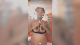 Pregnant Black Girl showing off titties for cash from Akron