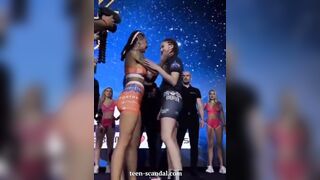 2 cute MMA fighters kiss and expose their tits live on television
