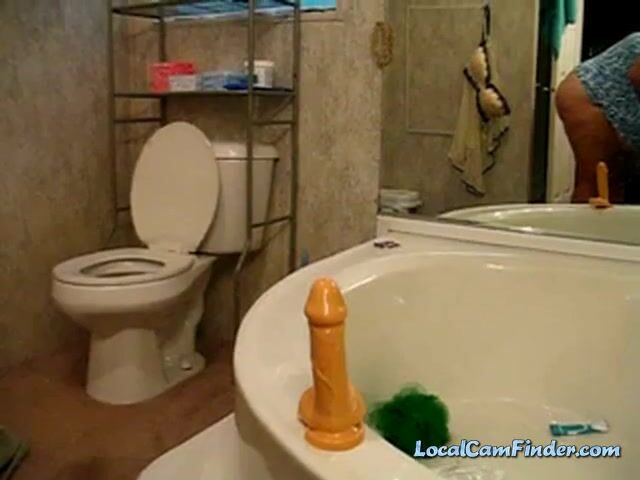 BBW Pleasures Herself with a Sex Toy on Webcam in the Bathroom