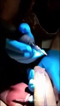a tattoo artist sucking on her clients cock to keep it hard which is needed for the t